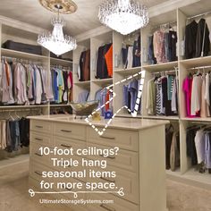 a closet filled with lots of clothes and chandelier hanging from it's ceiling