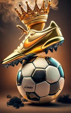 a soccer ball with a gold crown on top and a white soccer ball in the middle