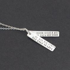 This is a beautiful hand crafted quote necklace that says "Of All The Paths You Take in Life, Make Sure a Few of Them Are Dirt" - by John Muir, also known as "John of the Mountains" and "Father of the National Parks." It's the perfect gift for any nature lover, graduate or traveler. Choose between sterling silver and 14kt gold vermeil. The quote is written on 2 bars, Each pendant measures roughly 1/4" x 1". Spiritual Hand Stamped Pendant Necklace, Handmade Spiritual Necklace For Best Friend, Handmade Spiritual Necklaces For Best Friend Gift, Inspirational Adjustable Hand Stamped Necklace, Inspirational Hand Stamped Adjustable Necklace, Inspirational Adjustable Necklace For Best Friend, Inspirational Sterling Silver Jewelry With Engraved Text, Adjustable Hand Stamped Meaningful Necklace, Inspirational Hand Stamped Necklace For Best Friend