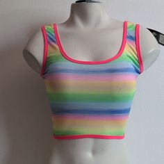 Pretty Rainbow Tank Top In A Sexy Stretchy Fabric. Fits Small/Med Fitted Multicolor Crop Top Tank, Trendy Fitted Multicolor Crop Top, Multicolor Fitted Cropped Tank Top, Playful Fitted Pink Tank Top, Fitted Pink Crop Top For The Beach, Fun Fitted Crop Top For Spring, Fitted Rave Tank Top For Summer, Fitted Fun Tank Top For Spring, Playful Fitted Tank Top For Spring