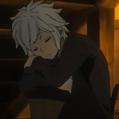 an anime character hugging another person in a dimly lit room