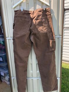 Dickie's Brown Carpenter Pants 100% Cotton Good condition Size 36 X 36 Measurements taken while laying flat Waist 18" Rise 12" Inseam 34 Length from top of waist to bottom of leg 46" Purchase price includes free shipping in Canada and the USA International shipping is available  Please contact before  purchase for shipping quote Any questions, just ask!  Vintage item, regular wear due to age should be expected Any known flaws/ markings will be listed No returns/ exchanges, but please contact if Brown Mens Pants, Brown Carpenter Pants, Carpenter Pants, Mens Trousers, Mens Pants, Vintage Items, Bathing Beauties, Display Homes, Trousers