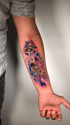 a person with a tattoo on their arm