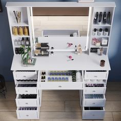 a white desk with drawers and bottles on it