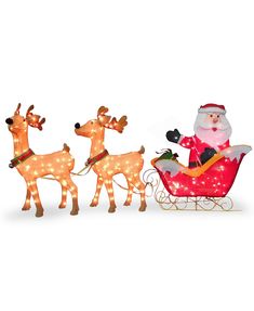 santa claus riding in a sleigh with reindeers and lights on the sides