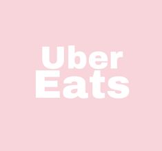 the words'uber eats'are white against a pink background, with an image of