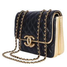 Authentic, pre-owned Chanel double flap quilted lambskin leather shoulder cross body bag in black. Features quilted leather with gold accent leather, gold hardware, a long gold chain strap with leather insert, front clasp closure. The interior features gold lambskin leather, double flap with snap closure, featuring large pockets with zipper and slip pocket. This bag is a Classic that you will love. Add your small cosmetic case, wallet, phone, keys, and more. Authenticity card and stamp read: 281 Chanel Double Flap, Vanity Case, Black Features, Gold Accent, Cosmetic Case, Quilted Leather, Cross Body Bag, Flap Bag, Lambskin Leather