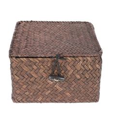 a brown woven box sitting on top of a white background