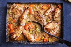 chicken stew with carrots, celery and green peppers in a square casserole