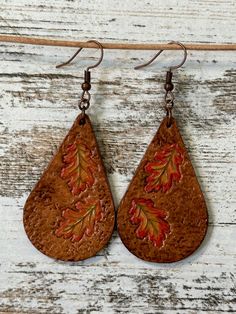 Teardrop tooled leather fall leaf earrings Stamp Earrings, Oak Acorn, Football Earrings, Stamped Earrings, Fall Leaf, Tooled Leather, Handcrafted Leather, Leaf Earrings, Leather Tooling