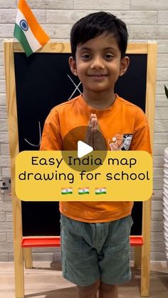 a young boy standing in front of a blackboard with the words easy india map drawing for school