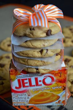 a box of jello pumpkin spice cookies next to a stack of chocolate chip cookies