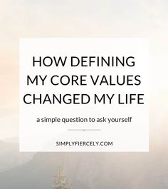 the words how deffining my core values changed my life are in front of mountains