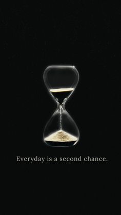 an hourglass with sand in it and the words everyday is a second chance written below