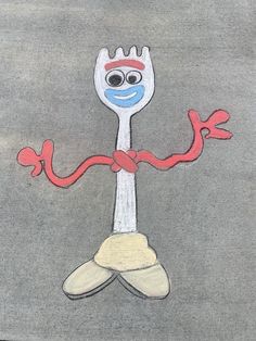 a drawing of a fork with eyes and legs