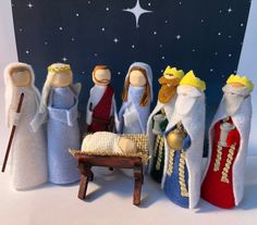 a nativity scene with three wise men and one baby jesus