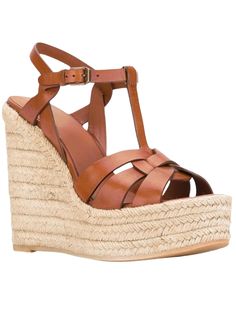 Looking for secured style for the spring/summer months? Bring the heat in a pair of these espadrilles. These casual, rope-soled shoes are usually flat but sometimes wedge heels are just what you need to elevate your look. Whether you're shopping for espadrille sandals with a flexible sole to wear with a summer midi dress or warm-weather shoes for vibing by the pool, a pair of these comfortable shoes is always a winner. Style: Wedges. Fabric: Pu Buckle strap. Open toe. Ankle tied. Rubber sole. Front heel height 2” in. Rear heel height 3.85” in. Color may be lighter or darker depending of the device it is displayed. Chic Wedge Sandals With Ankle Strap For Summer Outings, Chic Ankle Strap Wedge Sandals For Summer Outings, Chic Round Toe Wedge Sandals For Vacation, Chic Straw Platform Wedge Sandals, Spring Natural Wedge Sandals With Block Heel, Chic Closed Toe Wedge Sandals For Vacation, Chic Platform Wedge Sandals For Beach Season, Spring Natural Color Wedge Sandals With Block Heel, Chic Natural Heels For Beach Season