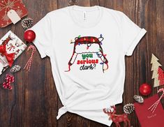 Funny Christmas Vacation shirt for anyone who loves classic Christmas movies! This shirt includes a Cousin Eddie original quote! Retro style font, for a fun design! Great for you or perfect as a gift! Want a different quote from the movie?-Message me for a custom design! This classic unisex jersey short sleeve tee fits like a well-loved favorite. Soft cotton and quality print make users fall in love with it over and over again. These t-shirts have-ribbed knit collars to bolster shaping. The shou Christmas Vacation Tshirt, Christmas Vacation Tshirts, Christmas Vacation Shirt, Vacation Tshirt, Christmas Vacation Shirts, Griswold Family, Griswold Family Christmas, Cousin Eddie, You Serious Clark