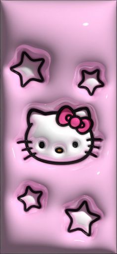 a pink hello kitty glass plate with stars