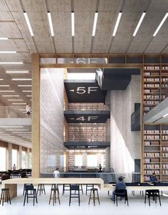 the interior of a library with tables and chairs