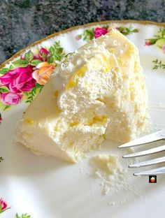 a piece of cake on a floral plate with a fork next to it and the rest of the cake has been eaten