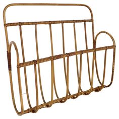 a gold metal rack with two handles