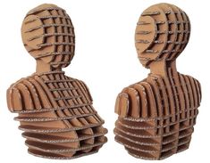 two wooden sculptures made to look like people