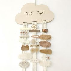 Description: Using this ornament can help to display girl's hair bows, clips, headbands, hair rings and so on, it can be placed on the wall which is tidy-keeping and space-saving. What this hairpin holder can offer you is that can be used as a perfect decoration to make your room more elegant and beautiful, it adopts a cute cloud shape and long tassel design which is very adorable and attractive. Made of cotton line and wood, it is very eco-friendly and durable. The length of this hairpin holder Hair Clip Storage, Headband Storage, Hair Clip Organizer, Hair Product Storage, Bow Storage, Headband Organizer, Hair Accessories Storage, Hair Clip Holder, Bow Organizer