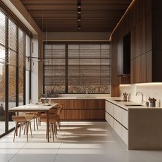 the kitchen is clean and ready to be used for dinner or lunchtime, with plenty of natural light coming in from the windows