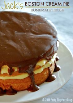 a cake with chocolate frosting and white icing on a plate that says jack's boston cream pie homemade recipe