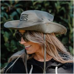 The Grunt Style Boonie Hat is the perfect accessory for any outdoor adventure in the summertime. Whether you're going on a hike, camping, or just spending a day outdoors, this Boonie Hat features a wide brim that will keep the sun off your face and neck to protect you from the elements. It is lightweight and comfortable with an adjustable chin strap to ensure a secure fit. One size fits most. Boonie hat with drawstring Polyester ripstop fabric Center front embroidery Metal eyelets Screen printed Hike Camping, Boonie Hat, In The Summertime, Grunt Style, Ripstop Fabric, Wide Brimmed, Outdoor Adventure, Summer Time, The Sun