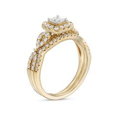 Give her a stunning symbol of your love with this glamorous diamond bridal set. Fashioned in 14K gold, the engagement ring showcases a 1/3 ct. princess-cut diamond wrapped in a cushion-shaped diamond-lined frame. The twist split shank sparkles with diamonds. On your wedding day, a contoured diamond-lined band completes her look. Radiant with 1 ct. t.w. of diamonds and a brilliant buffed luster, this bridal set is only the beginning of your romantic journey. Classic Diamond Bridal Sets With Halo Setting, Yellow Gold Brilliant Cut Bridal Sets For Promise Ring, Yellow Gold Bridal Sets With Brilliant Cut Cubic Zirconia, Yellow Gold Brilliant Cut Cubic Zirconia Bridal Sets, Yellow Gold Diamond Bridal Set With Center Stone, Classic Bridal Sets With Halo Diamond Setting, Yellow Gold Diamond Bridal Sets For Wedding, Yellow Gold Round Cut Diamond Bridal Sets, Yellow Gold Bridal Sets With Center Stone Diamond