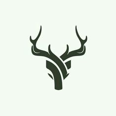 an antelope's head with horns is shown in this black and white logo