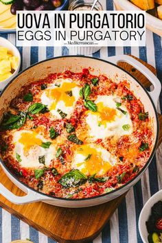 an egg dish with spinach and cheese in a pan