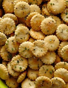 a bowl filled with crackers covered in seasoning