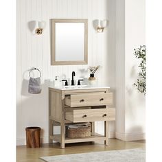 a bathroom vanity with two drawers and a mirror on the wall next to a rug