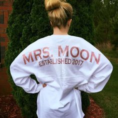 the back of a woman's shirt that says mrs moon established 2011 on it