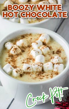 two white bowls filled with hot chocolate and marshmallows