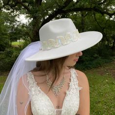 Wedding Fedora Hat White Felt with Scalloped Hatband of White and Iridescent Sequins. One of a Kind. The 34 Inch Veil is Two Shear Layers. A truly one-of-a kind hat for your special occasion This is a perfect Hat and Veil for a Church, Garden, Casual or Formal Wedding. This Accessory would complement any Bride and Her Wedding. One size fits most - Soft elastic band inside hat adjusts to most hat sizes. Fitted White Felt Hat With Wide Brim, Fitted White Wide Brim Felt Hat, White Fitted Wide Brim Felt Hat, White Brimmed Felt Hat For Party, White Fedora Felt Party Hat, White Fedora Felt Hat For Party, White Fedora Hat For Party, White Curved Brim Felt Hat For Parties, White Felt Hat With Curved Brim For Party