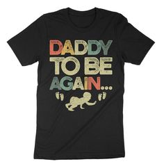 We offer FREE shipping in the US!   Eco Friendly Production  All our t-shirts are eco-friendly and ethically made. This Daddy To Be Again Retro shirt is a premium t-shirt made out of 100% ring spun cotton and sustainable threads. This is a Daddy To Be Again, Second Time Dad Shirt, Best Dad Shirt, Baby Announcement Shirt, Pregnancy Announcement Shirt, New Baby Shirt, Dad Gift.   Shipping and Processing Time  All items are printed on demand. This means that we start production immediately after yo Funny Text Crew Neck T-shirt For Parenting, Cotton T-shirt For Gender Reveal, Relaxed Fit, Cotton T-shirt With Relaxed Fit For Gender Reveal, Relaxed Fit Cotton T-shirt For Gender Reveal, Cotton Relaxed Fit T-shirt For Gender Reveal, Baby Announcement Shirt, Best Dad Shirt, Baby Announcement Shirts, Pregnancy Announcement Shirt