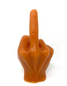 an orange plastic finger sign on a white background