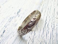 Floral Pattern Sterling Silver Ring Wedding by wwcsilverjewelry, $40.00 Nature-inspired Flower Wedding Rings, Vintage Wedding Toe Ring With Flower Design, Vintage Wedding Flower Toe Ring, Wedding Engraved Ring With Etched Details, Heirloom Wedding Flower Ring With Engraving, Flower Shaped Wedding Rings With Intricate Design, Heirloom Wedding Flower Ring Engraved, Adjustable Engraved Ring With Intricate Design For Wedding, Engraved White Gold Flower Ring For Wedding