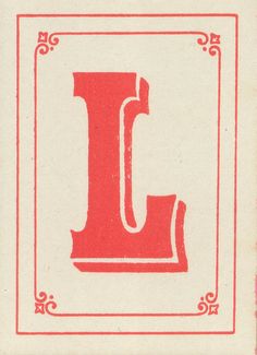 the letter j is made up of red and white paper with an ornate border around it