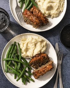 two plates with meat, mashed potatoes and green beans