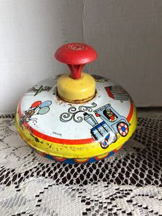 an old fashioned toy sitting on top of a table