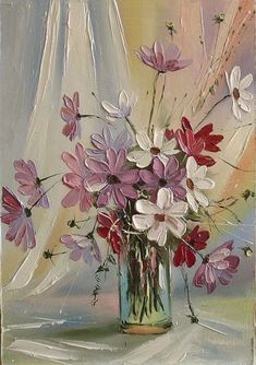 a painting of pink and white flowers in a glass vase on a cloth covered table