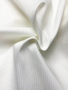 White Herringbone Pocketing Also know as Silesia, named after a province in Prussia, this fabric is used to make the pockets and inner waistbands of trousers and skirts. This material is 95 GSM twill with a 80% polyester, 20% cotton composition. This fabric is machine washable or can be dry-cleaned and should be pressed with a medium temperature iron. All orders will be cut in one continuous piece and are shipped within 24 hours. Please note that we try our best to portray all fabric colors as a Classic Spring Wedding Bottoms, Classic Wedding Bottoms For Spring, Classic White Pants For Wedding, Elegant Cotton Pants For Wedding, White Cotton Wedding Pants, Suit Shorts, Suit Hat, Pants Gift, White Herringbone