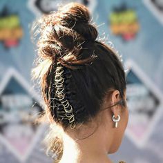 Shay Mitchell - Hair jewelry and baubles have always been around, but pierced braids have not. Many credit Shay's hairstylist, Chris Appleton, for bringing this bold hair trend into the public eye.Watch us try it ourselves here.