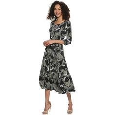 A bold print and midi length give this women's Nina Leonard dress a classic look. A bold print and midi length give this women's Nina Leonard dress a classic look. Watch the product video here. Bold print Scoopneck 3/4-length sleeves Coordinating sash UnlinedFIT & SIZING 48-in. approximate length from shoulder to hem Midi cut Pull-on designFABRIC & CARE Polyester, spandex Machine wash Imported Size: Small. Color: Black. Gender: female. Age Group: adult. Pattern: Pattern. Dress Guide, Sweater Dresses, Print Midi Dress, Short Coat Jackets, Romper With Skirt, Printed Midi Dress, Evening Wear, Midi Length, Polyester Spandex