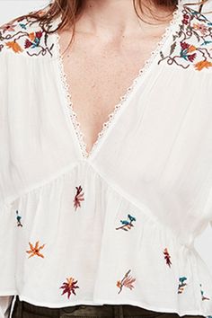 Free People Ava Embroidery Blouse - Ivory – shophearts Spring V-neck Blouse With Chikankari Embroidery, White V-neck Blouse With Chikankari Embroidery, Spring V-neck Chikankari Embroidered Top, Summer Long Sleeve Embroidered Top With Floral Print, Chic Long Sleeve Embroidered Top With Floral Embroidery, Summer Long Sleeve Floral Embroidered Top, Chic Long Sleeve Floral Embroidered Top, Chic Long Sleeve Embroidered Top, Spring Long Sleeve Tops With Chikankari Embroidery